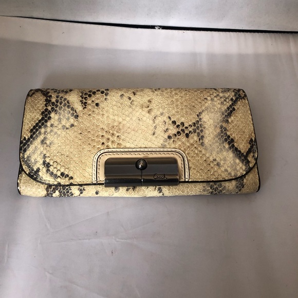 Coach Handbags - DONATING SOON Coach snake pattern flap wallet